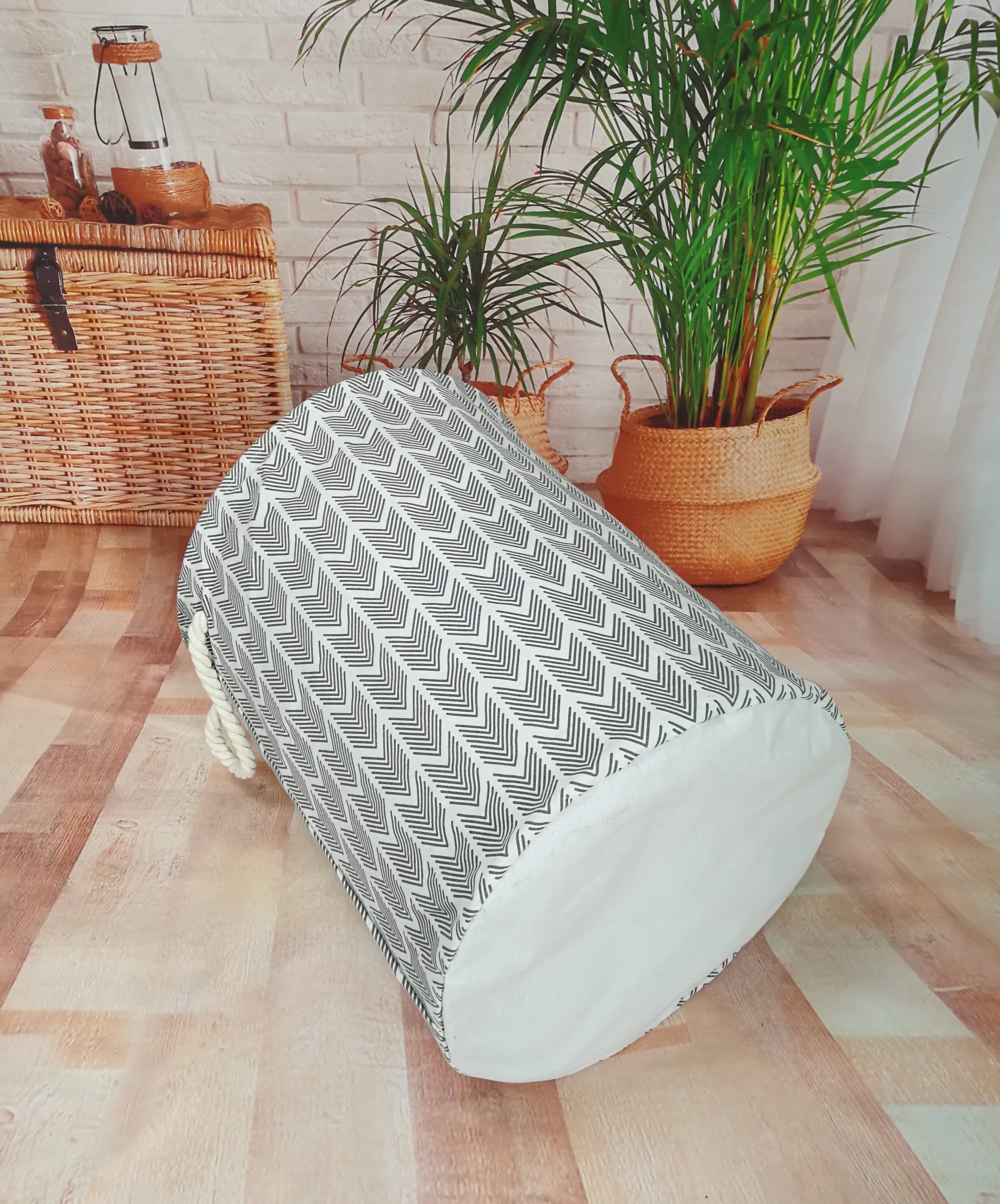 VAIVUSTO round laundry basket complements room decor with modern round design
