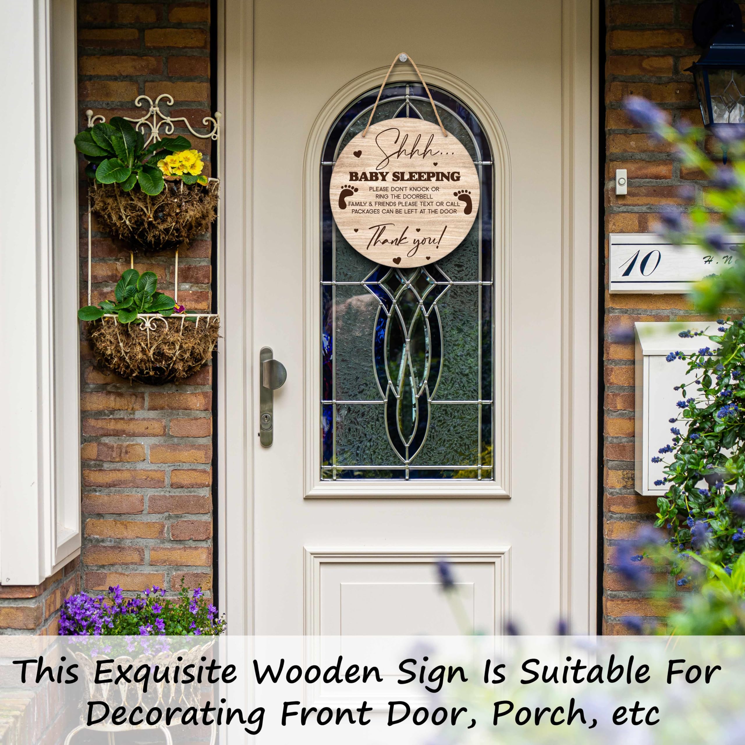 Valucise baby sleeping sign hung on porch offers warm, inviting curb appeal.