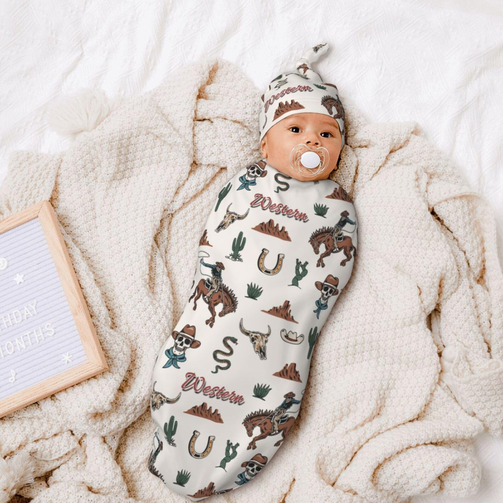 Valvphora baby wearing western-inspired swaddle set during nap