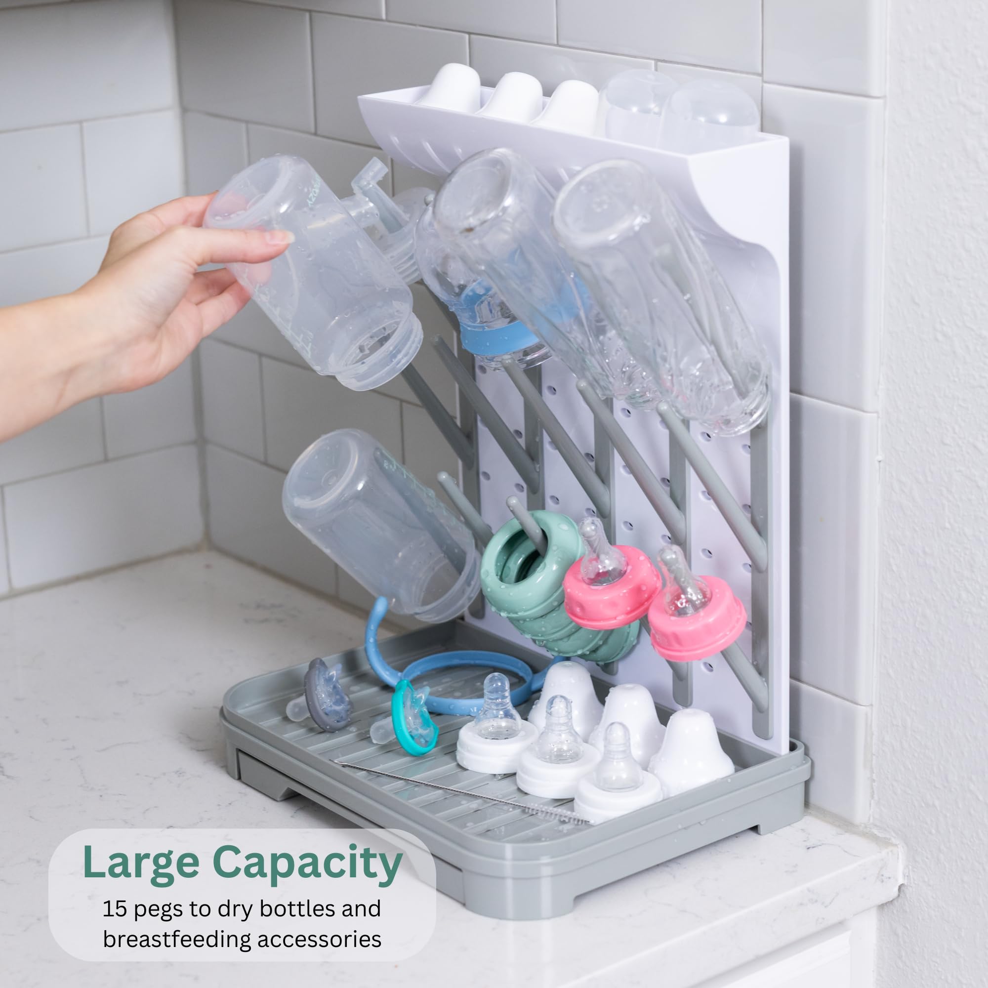 Velakade Baby Bottle Drying Rack vertical assembly demonstrates space-saving design for small kitchens