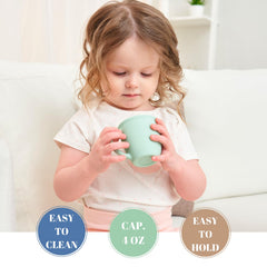 Vemolea 4oz capacity cup shown with water for small sips.