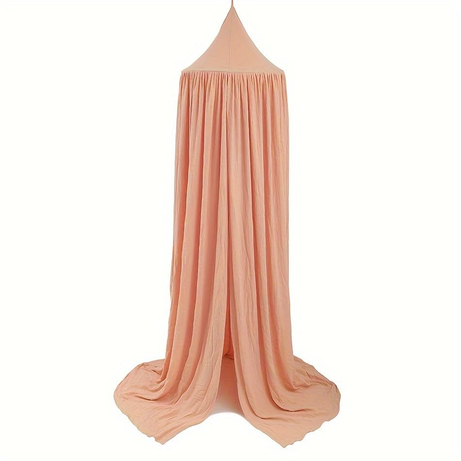 Vhaso cotton kids bed canopy over a crib creates a cozy, light-filtering sleeping nook.