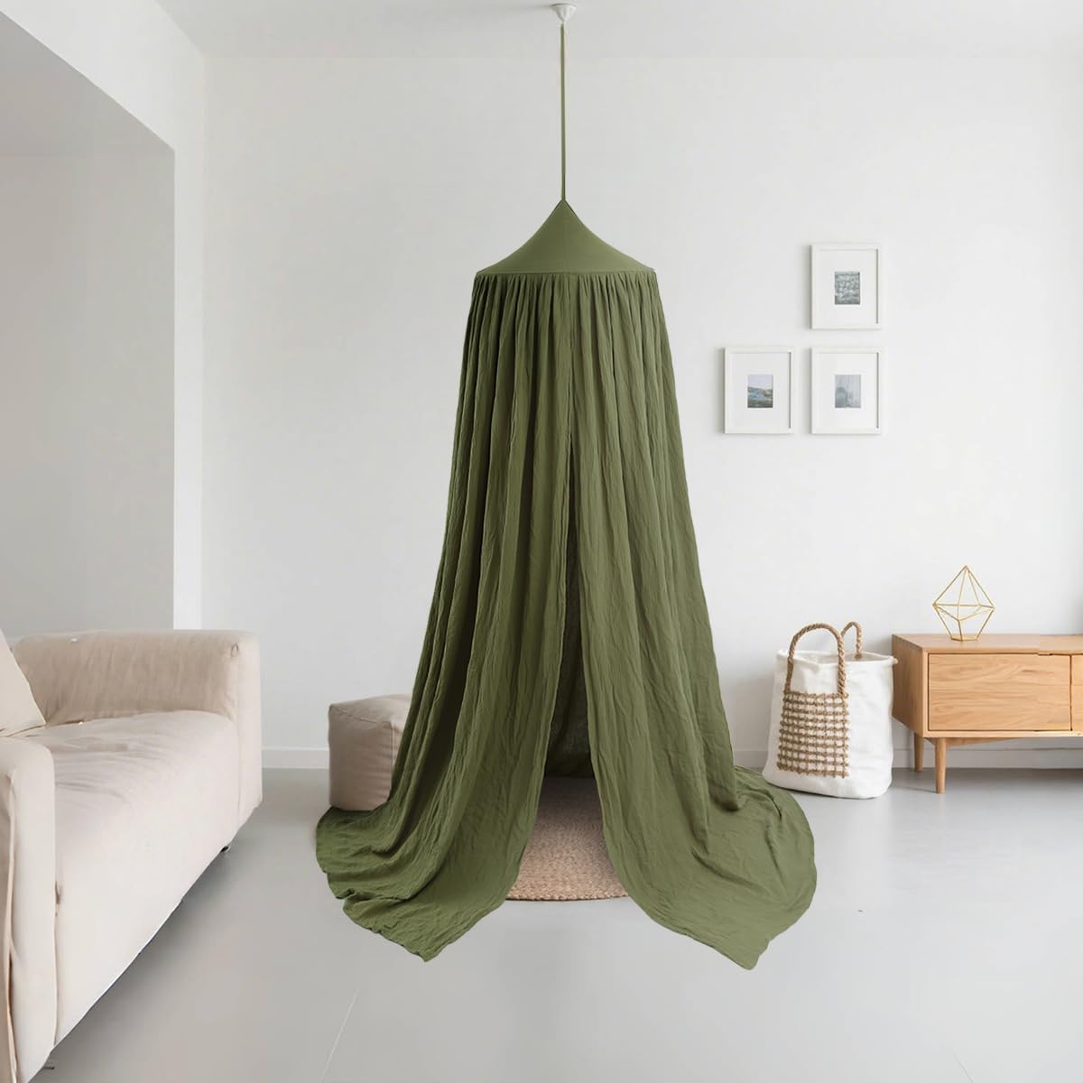 Vhaso cotton kids bed canopy in pastel green used as play-and-sleep hideaway.