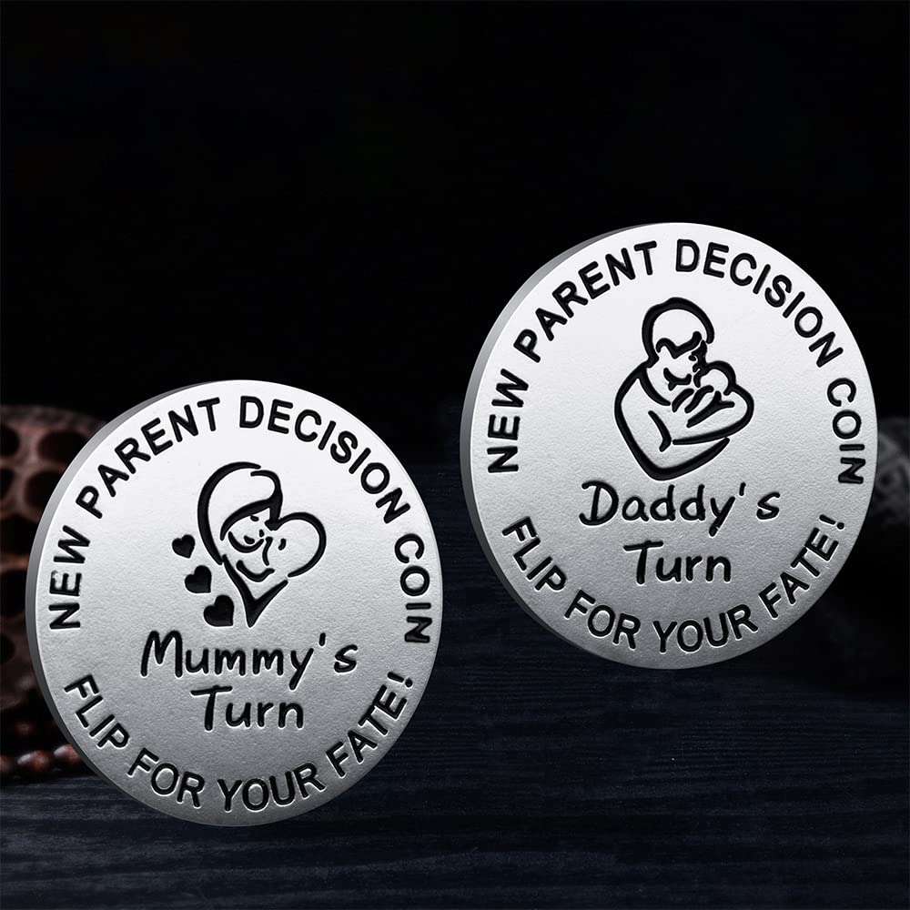 Vichona decision coin in hand, pocket-size gift for new parents