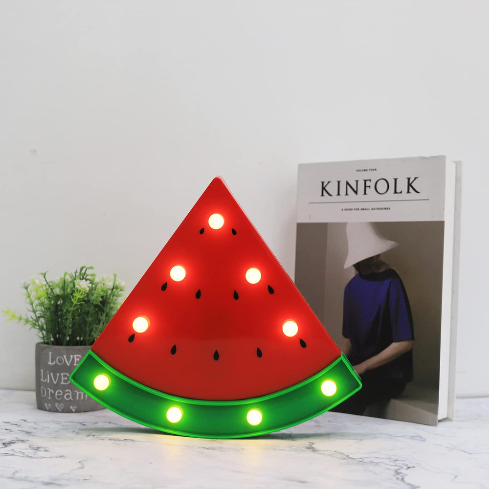 Vicila watermelon-night-light-table-setup creates cozy ambience on dresser or mantle.