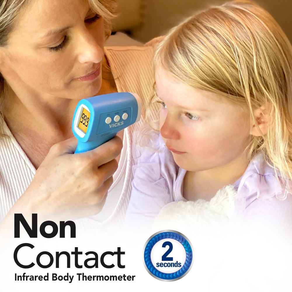 Vicks non-contact thermometer forehead-distance guide shows 0.4 to 2 inches for accuracy.