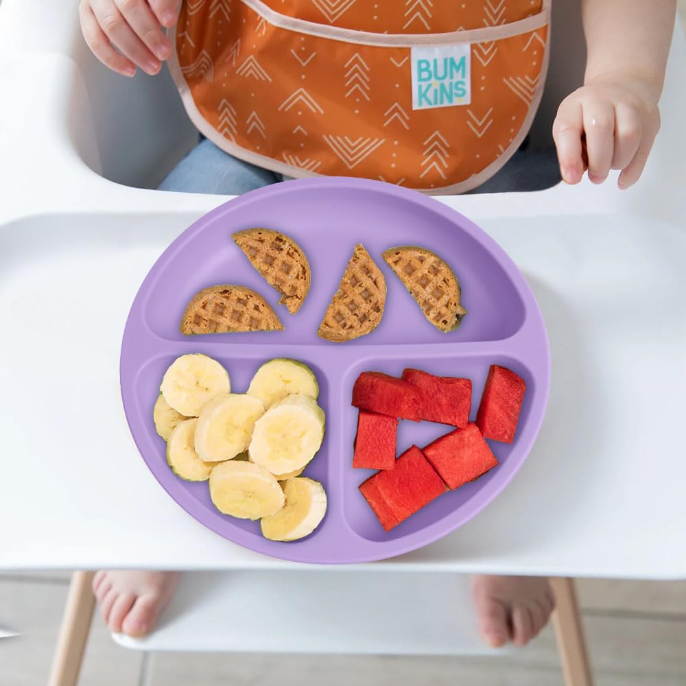 Vicloon divided plate presenting colorful foods to a toddler