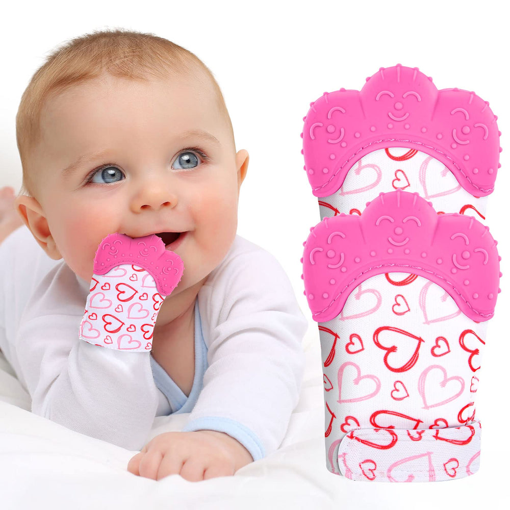 Vicloon teething mitt on a baby hand provides soothing gum relief.