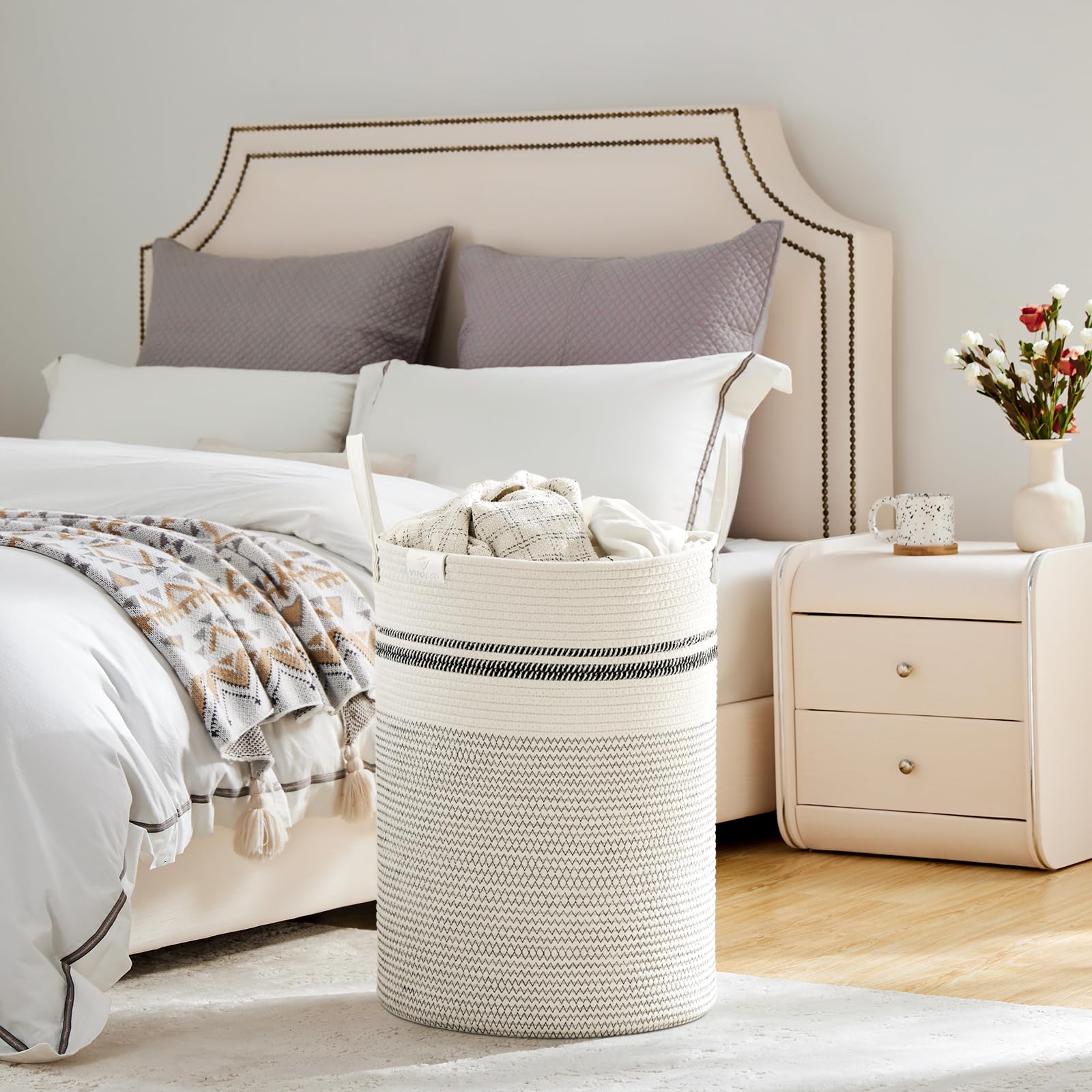 VIPOSCO tall laundry basket in living room demonstrates minimalist storage solution