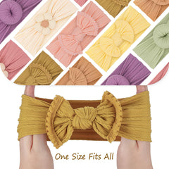 VISBL cable-knit bows close-up highlights soft comfortable fit for babies