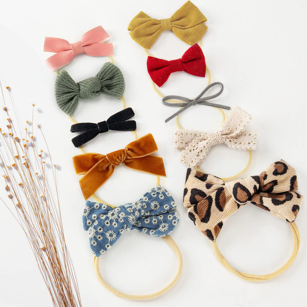 VISBL newborn photoshoot accessory bows enhance cute timeless portraits