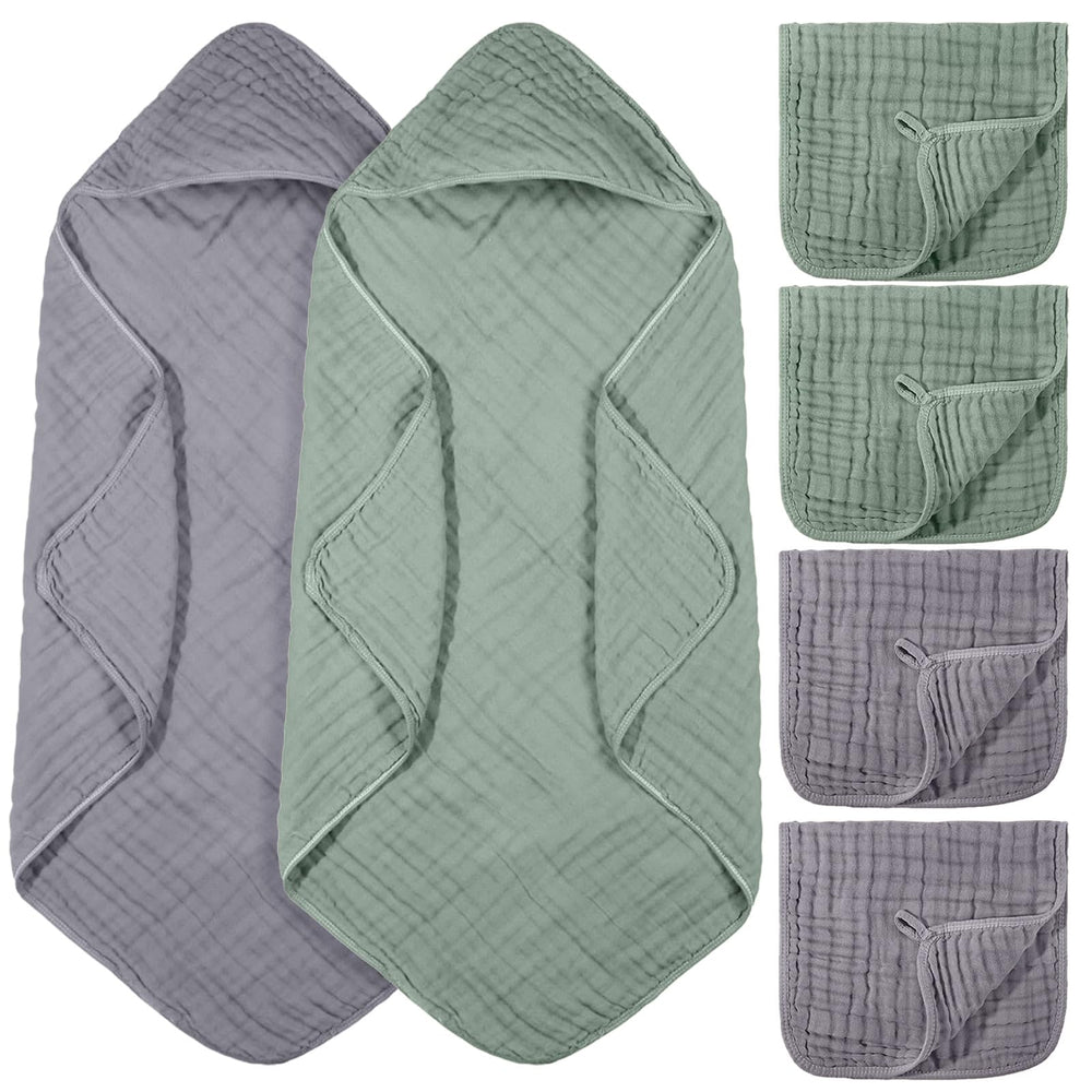 VitalCozy green hooded towel keeps newborn warm after bath