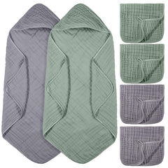 VitalCozy green hooded towel keeps newborn warm after bath