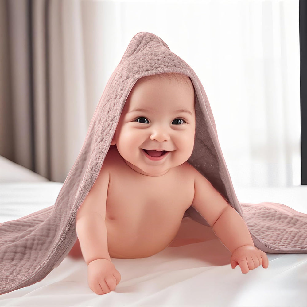 VitalCozy hooded towel folded multicolor image showcases stylish, gift-ready baby care set.