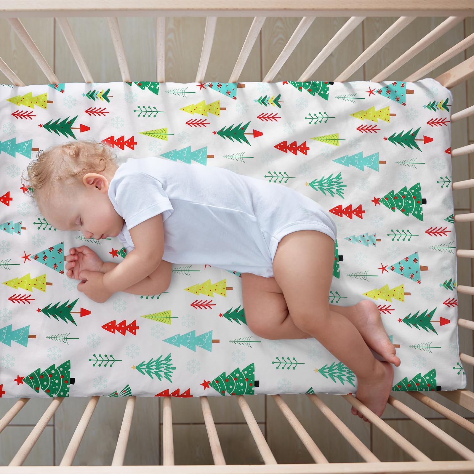 VitalCozy Christmas Tree crib sheet creates a bright holiday focal point