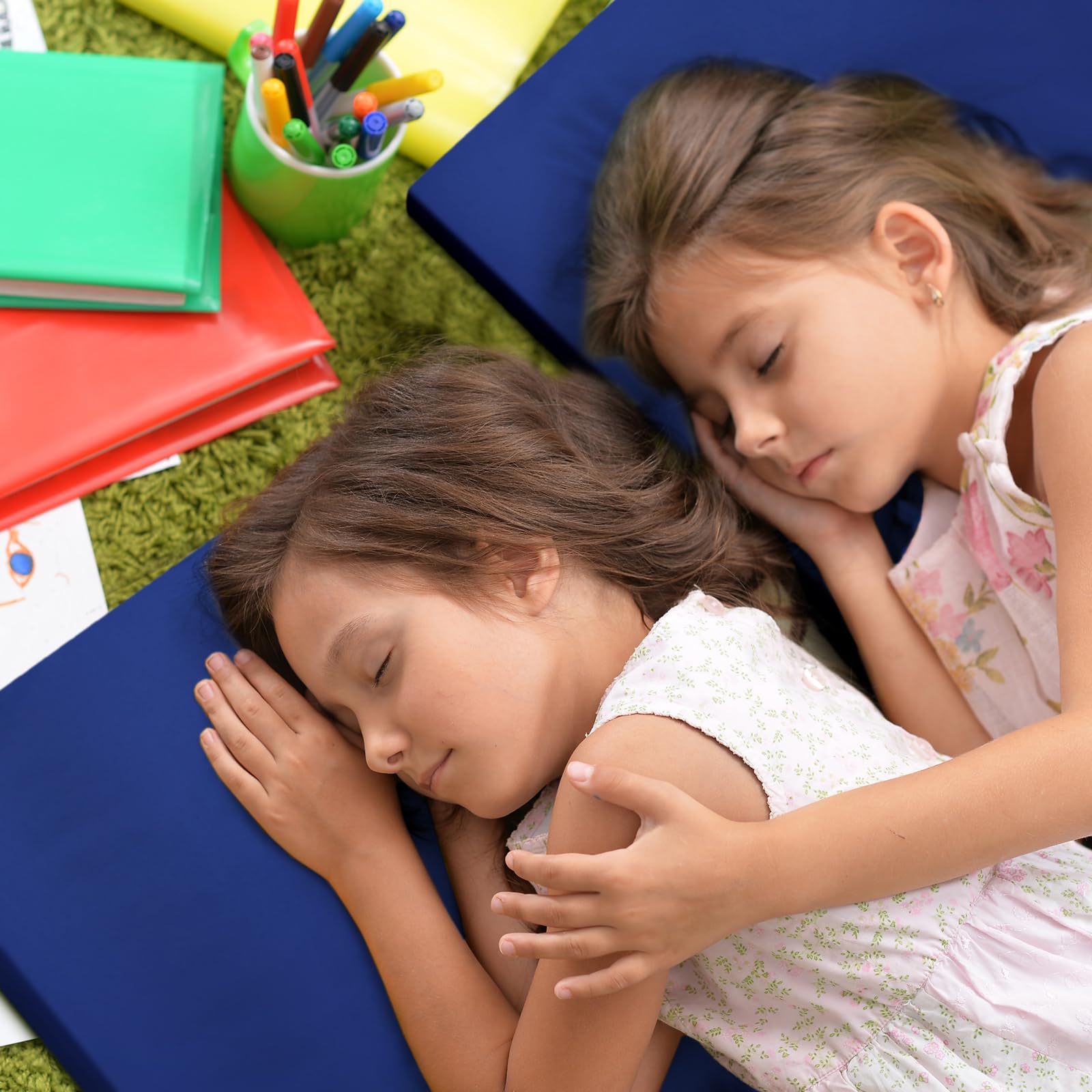 VitalCozy elastic-strap cot sheets wrapped around corners ensuring a secure nap surface