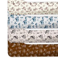 VitalCozy vintage western cowboy crib sheet set folded to reveal 90g polyester texture.