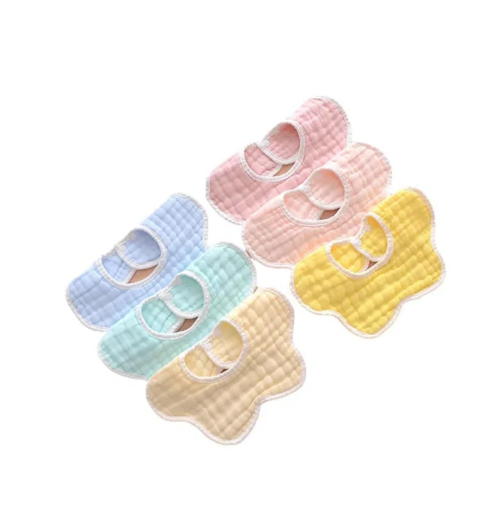 VIVANA muslin baby bib in multicolor floral shape, ideal for drool absorption during teething.
