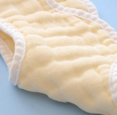 VIVANA baby bib adjustable closure demonstrates secure fit for growing infants.