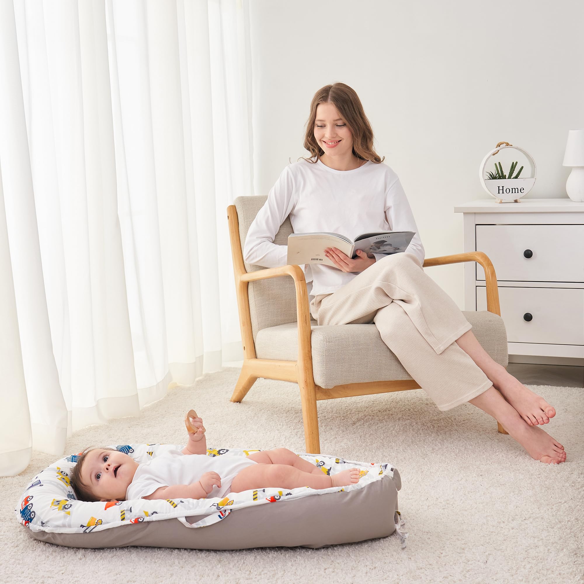 Viviland baby lounger-in-use-sofa demonstrates versatile home lounging.