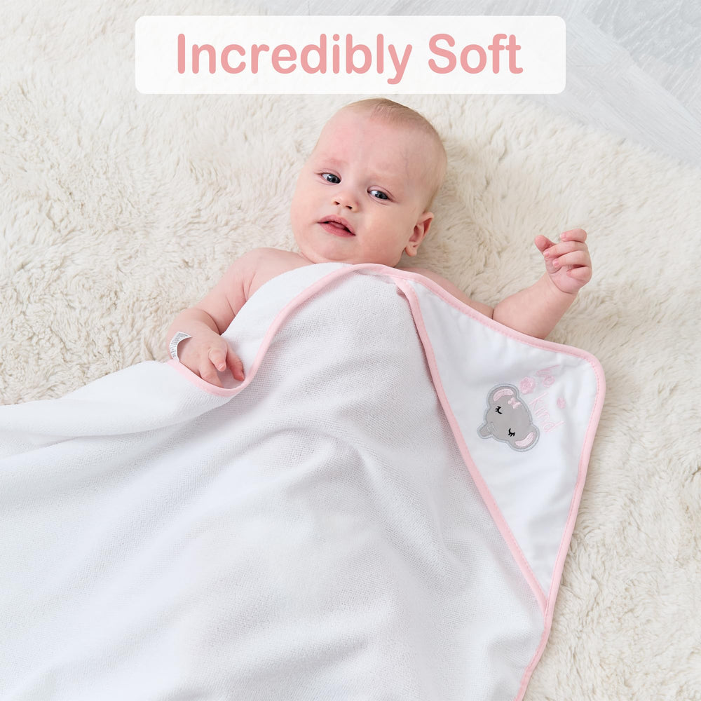 Viviland Elephant Flower towel folded for compact nursery storage.