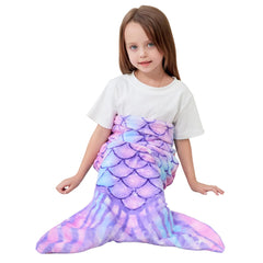 Viviland Mermaid Tail Blanket girl cuddling on couch for relaxed play