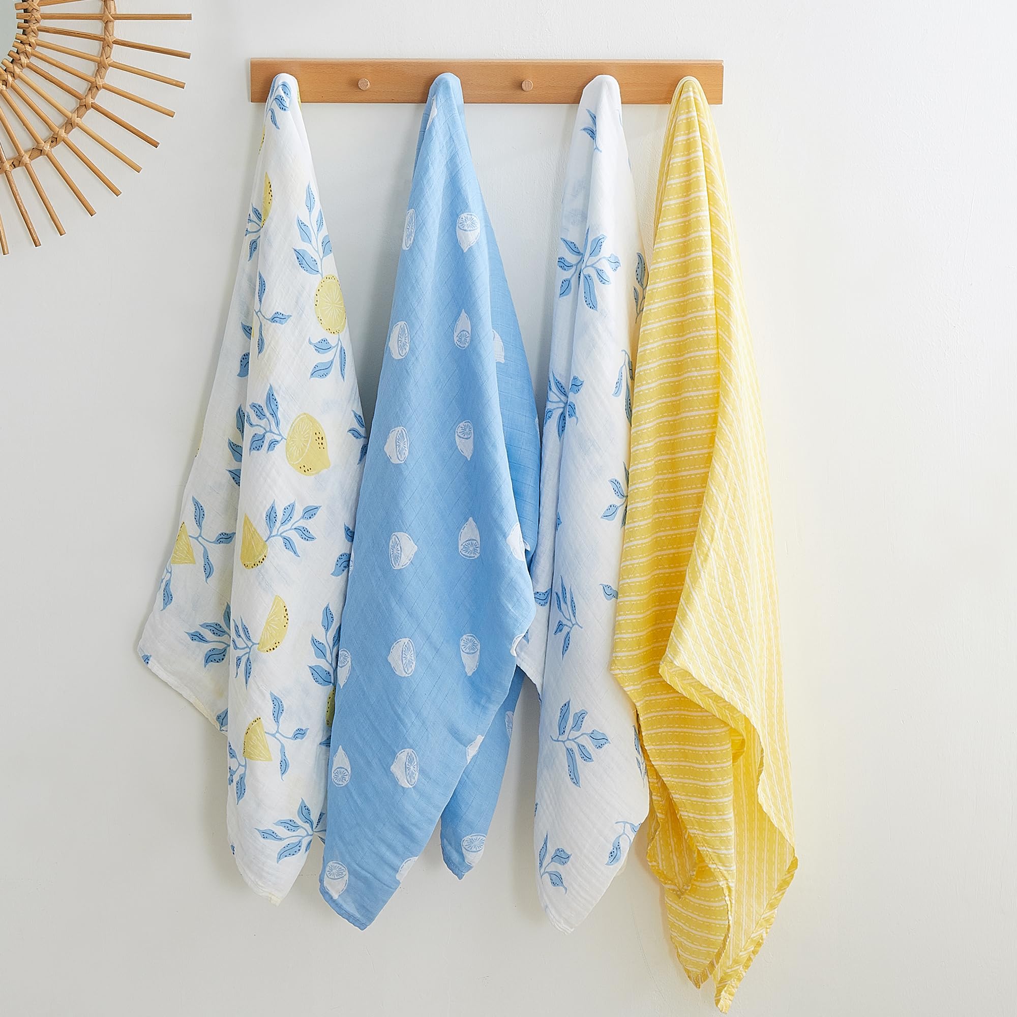 Viviland Muslin Swaddle Blankets lemon-leaves-packshot illustrates 4-pack value and cheerful design.