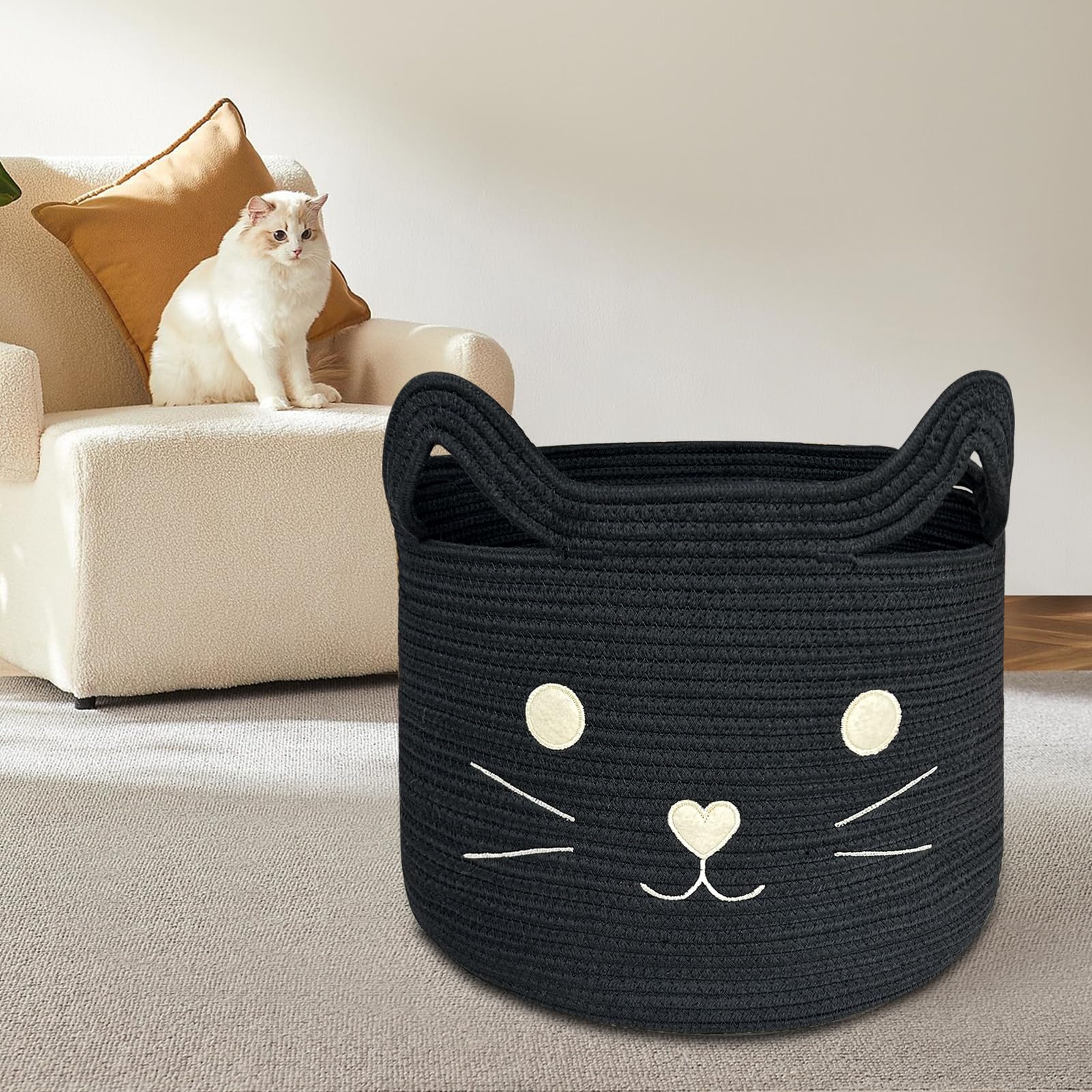 VK VK·LIVING cat-themed storage basket complements nursery and living room decor.
