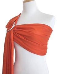 Vlokup baby water ring sling in water demonstrates close baby-care in pool bonding.