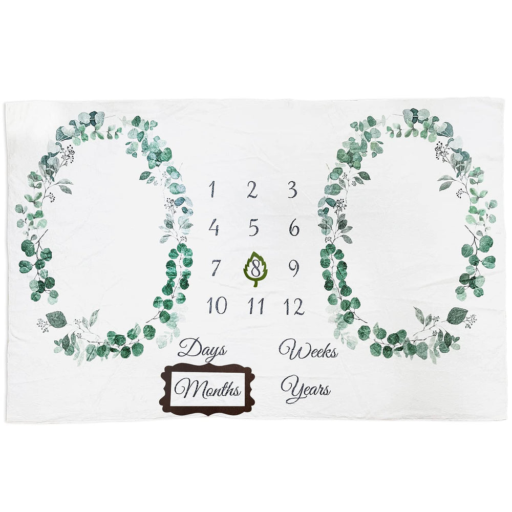 Vlokup milestone blanket laid flat shows the neutral green leaf wreath