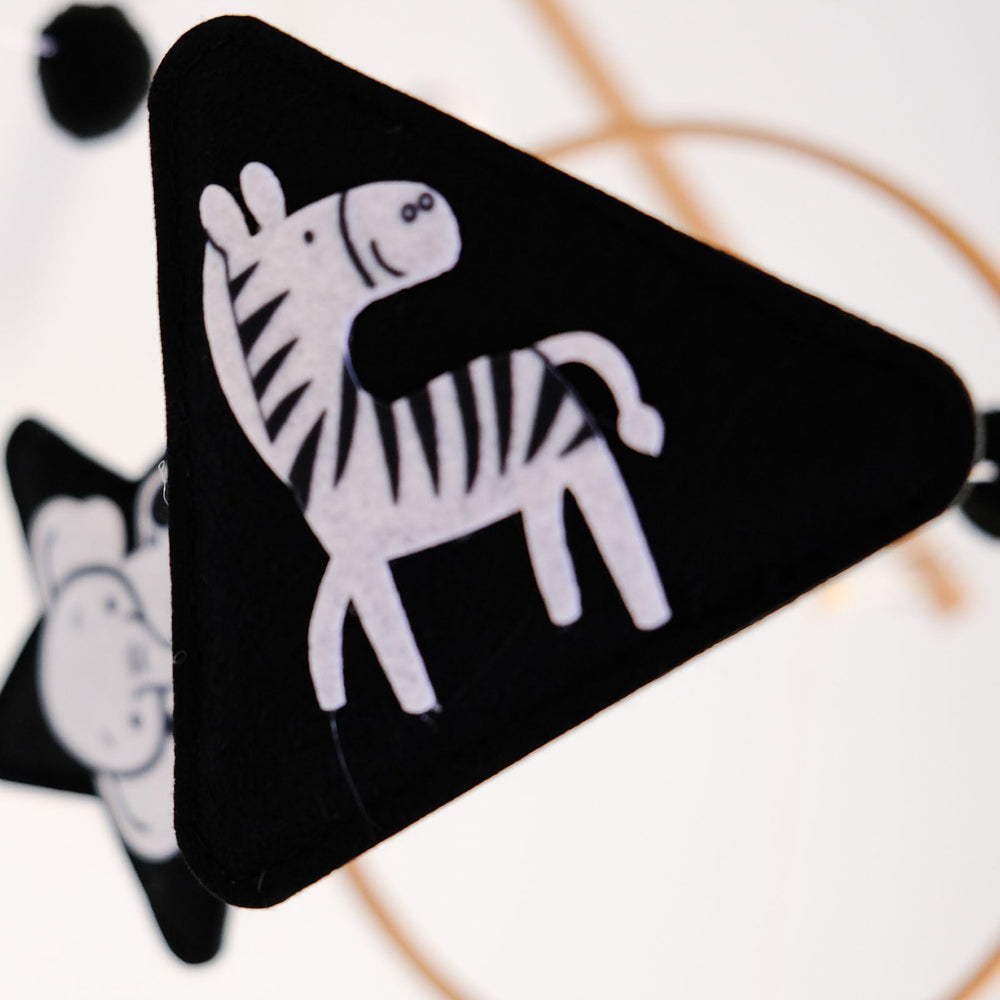 Vlokup Montessori mobile facing-baby design encourages face-to-face visual connection.