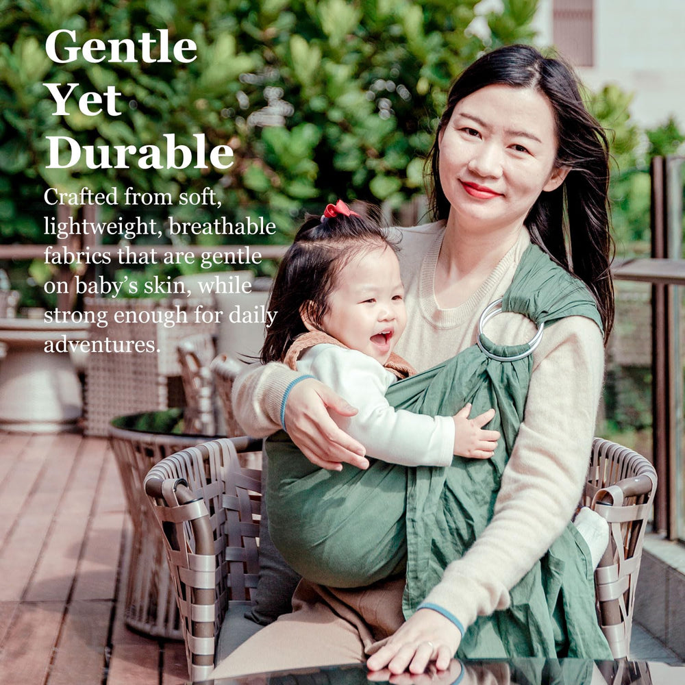 Vlokup ring sling in green suitable from newborn to toddler growth.
