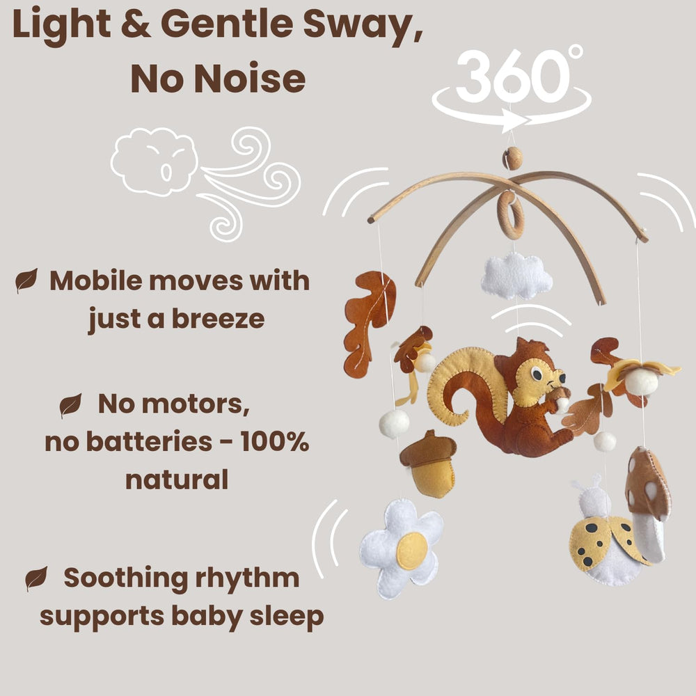 VN3BTOY baby mobile in use over crib promoting gentle visual stimulation.