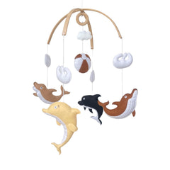 VN3BTOY Ocean Montessori Dolphin Mobile with hand-sewn dolphins supports calm nap time and gentle visual stimulation.