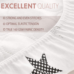 VOLHA & CO hourglass-fit sheet on bassinet, designed to stay put.