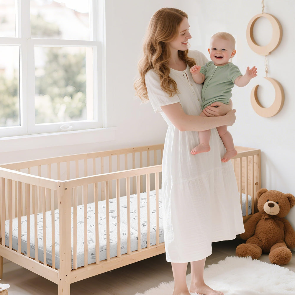voomf Pack N Play mattress 38x26 inches showing precise dimensions for snug fit.