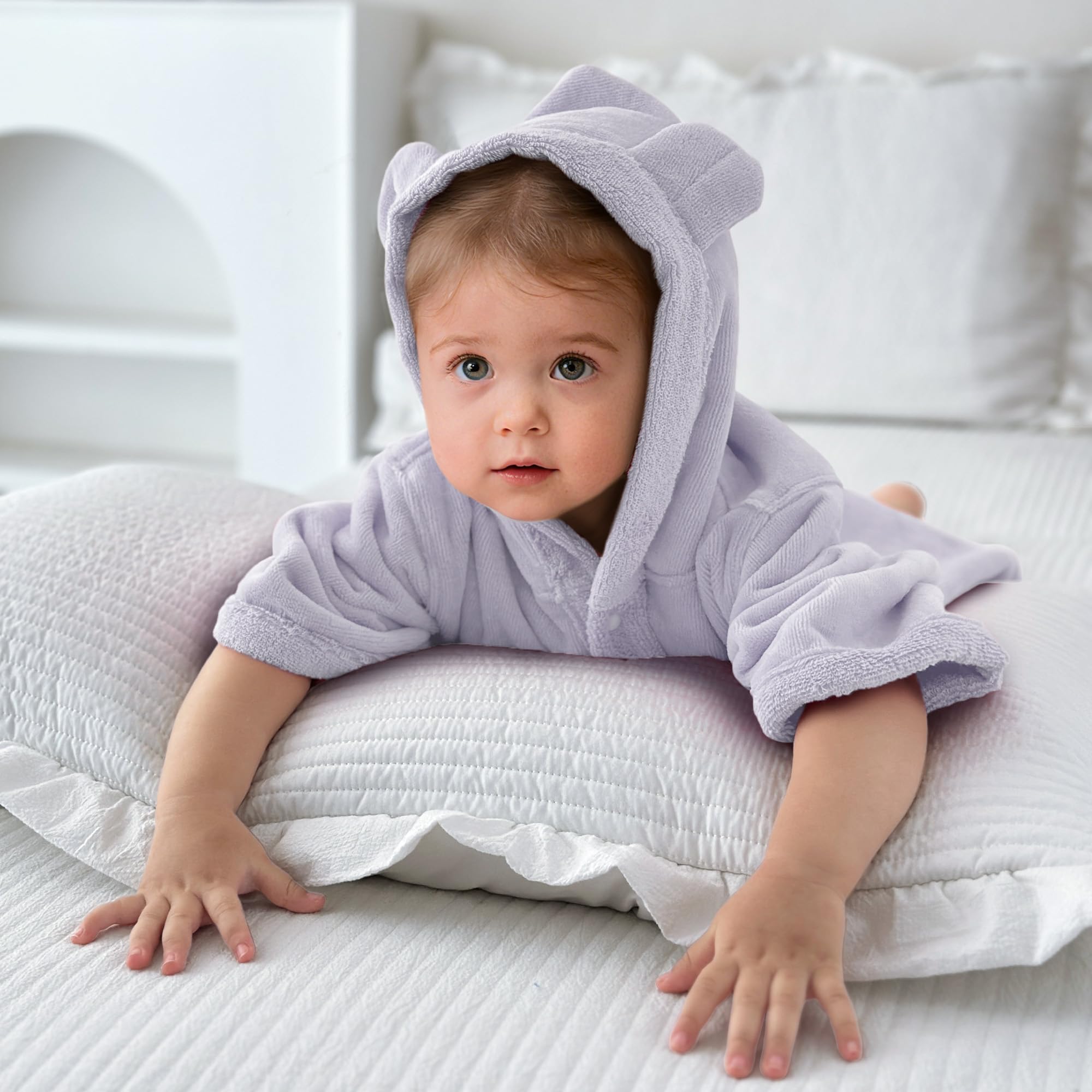 VOOVA & MOVAS bath-time ready purple towel for pool or tub adventures.