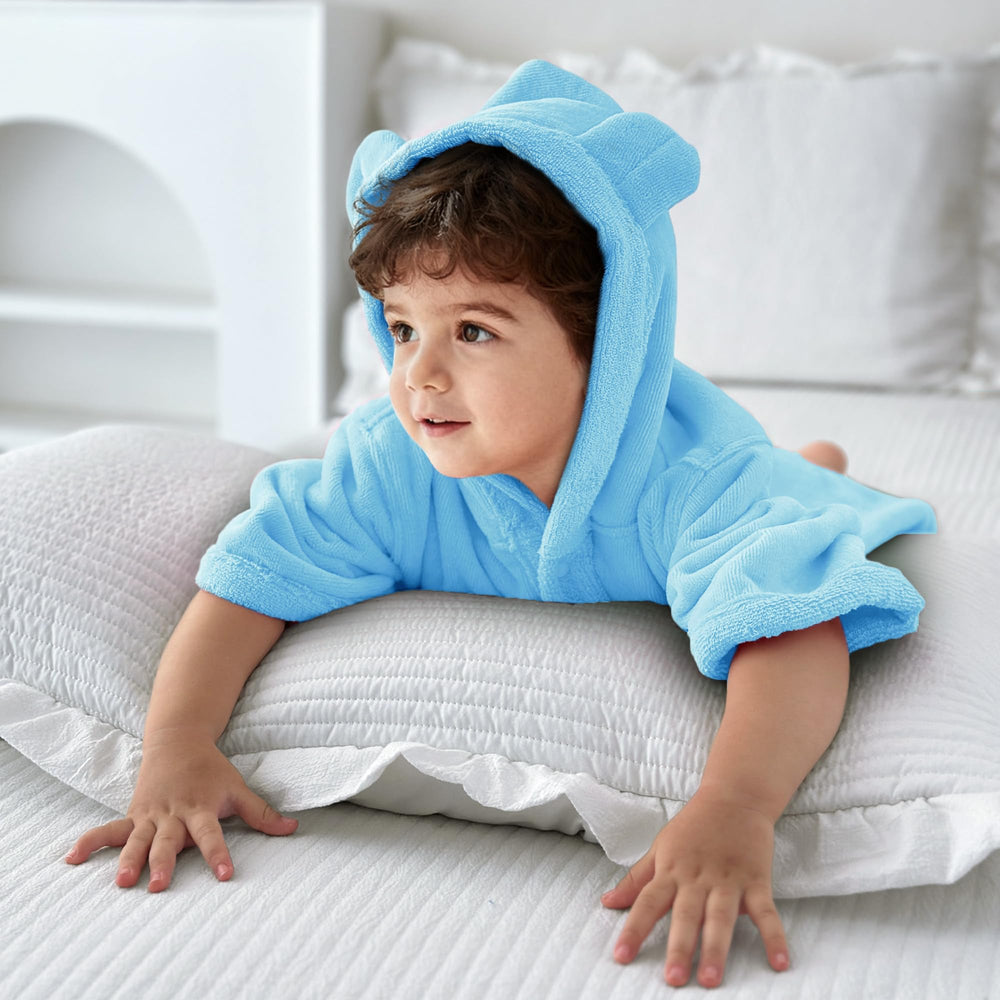 VOOVA & MOVAS blue towel on bath setup ready for swimming or bath