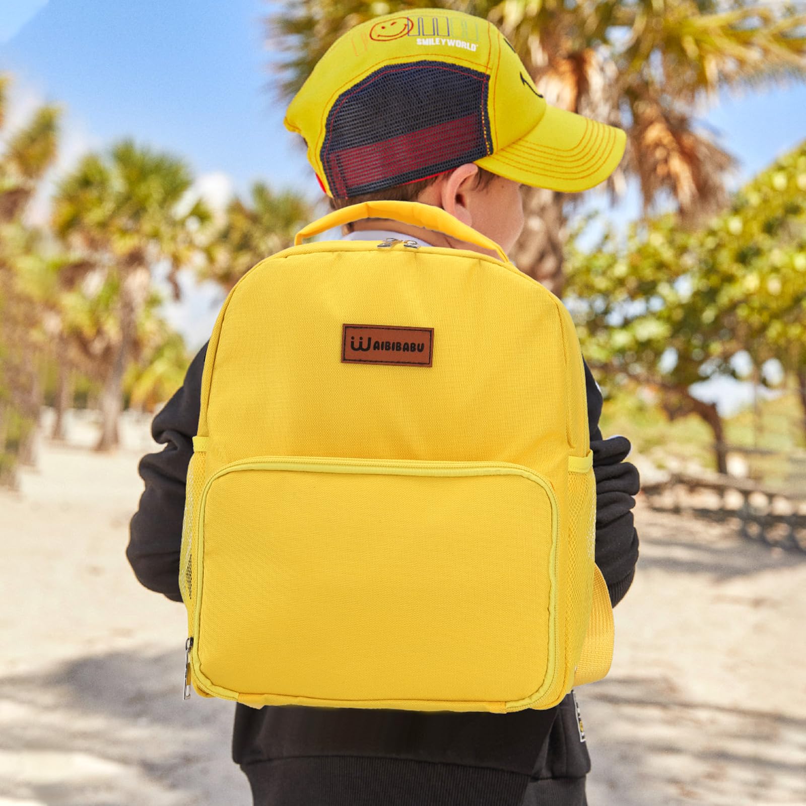 WAIBIBABU feeding tube backpack compact-size illustrates fit for small children.