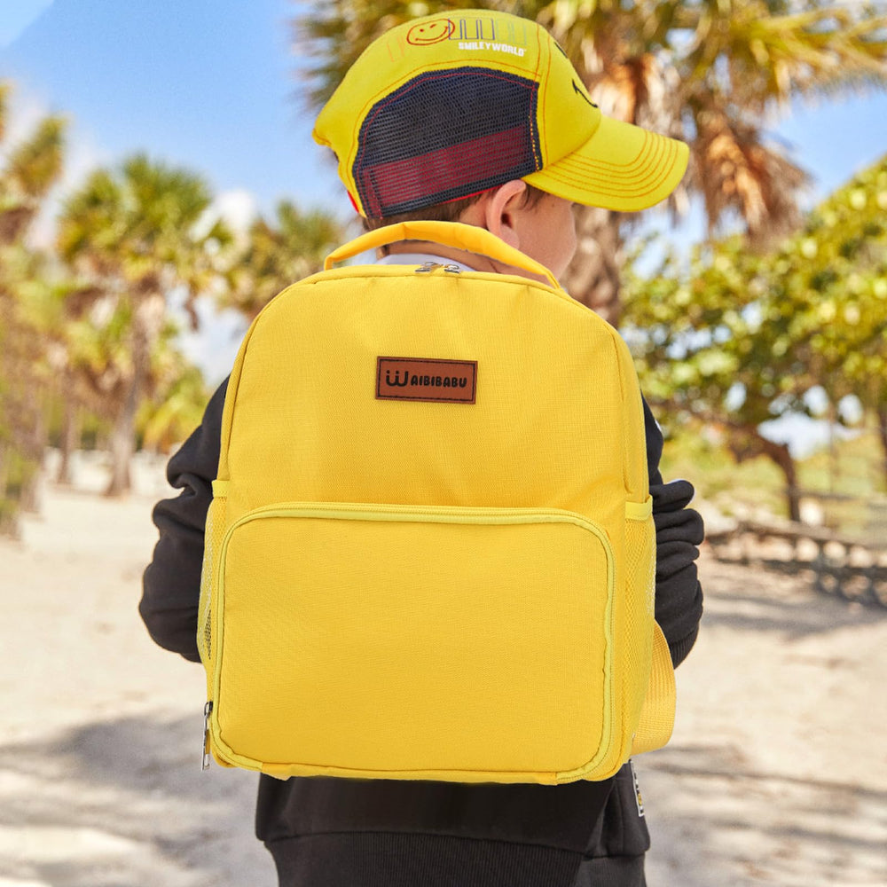 WAIBIBABU feeding tube backpack compact-size illustrates fit for small children.