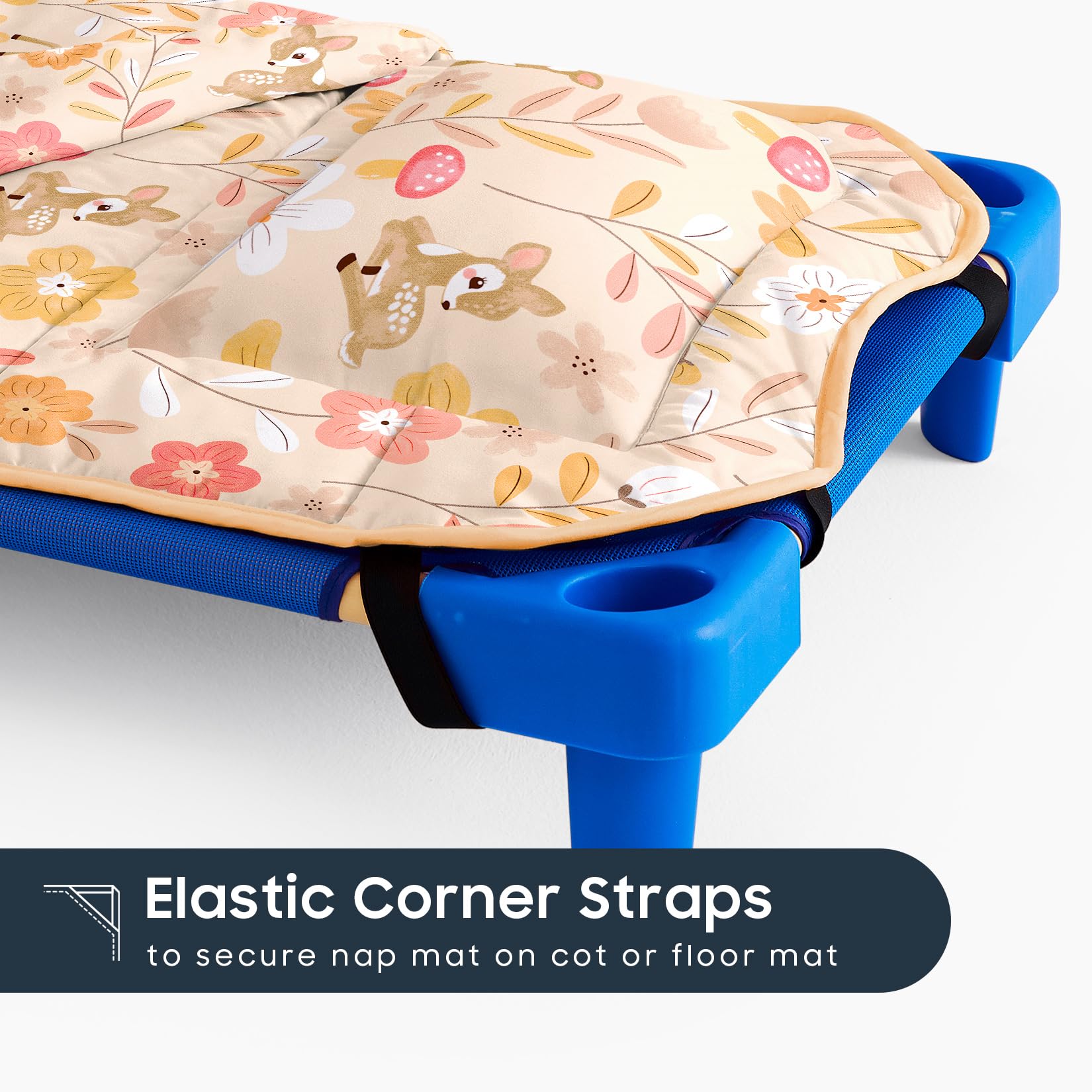 Wake In Cloud cot nap mat highlighting elastic corner straps for secure fit