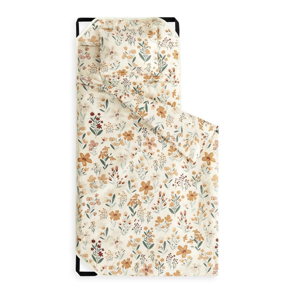 Wake In Cloud cot nap mat floral orange cream closeup highlights vibrant pattern for cozy preschool naps.