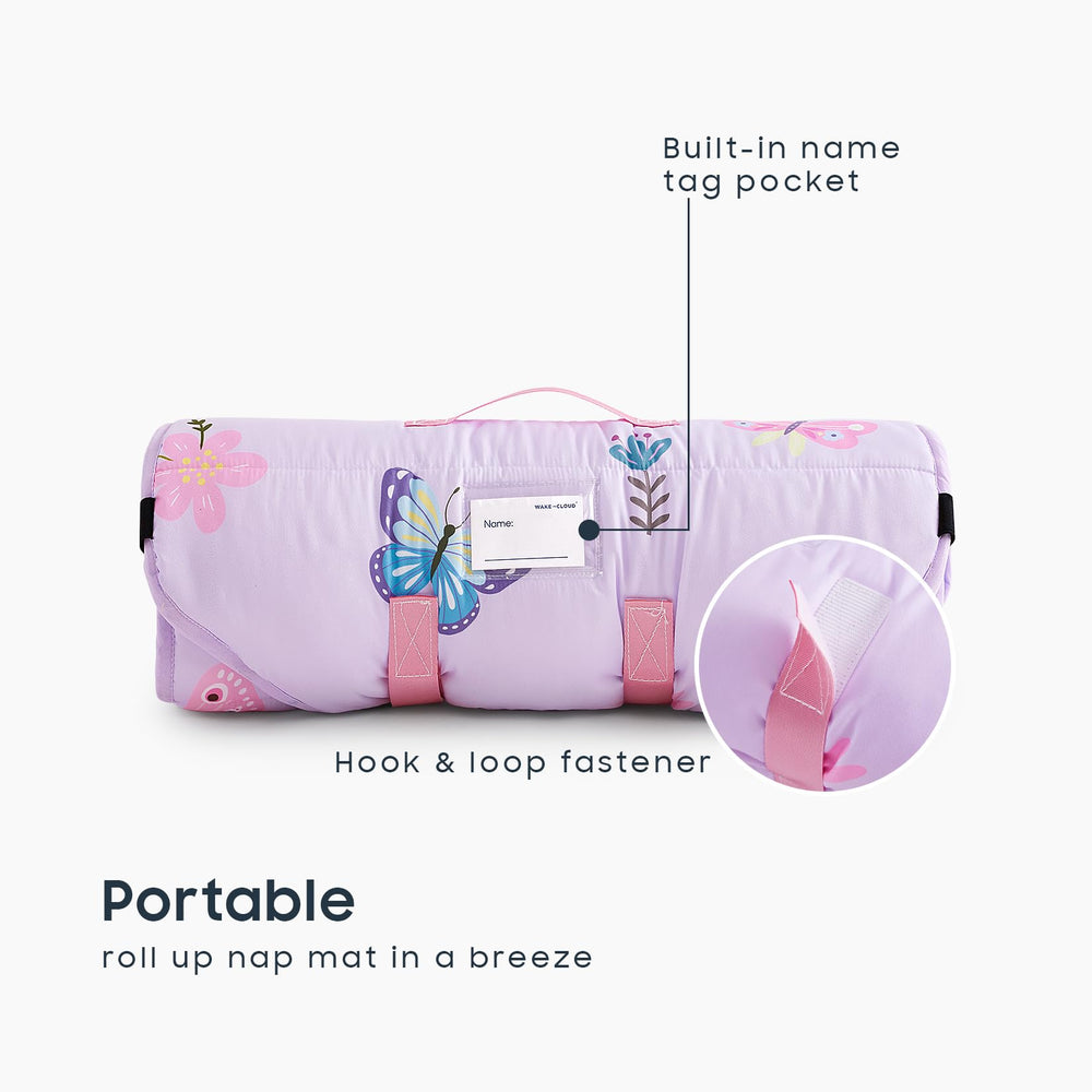 Wake In Cloud cot nap mat pillow detail shows detachable pillow for flexible resting options.