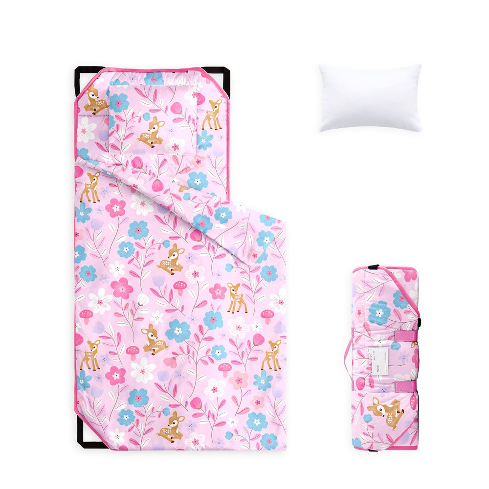 Wake In Cloud cot nap mat with woodland floral design for cozy daycare naps.