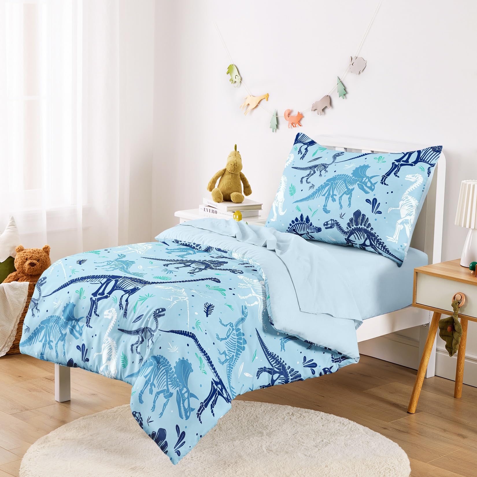 Wake In Cloud dinosaur bedding flat sheet in light blue for cozy toddler coverage