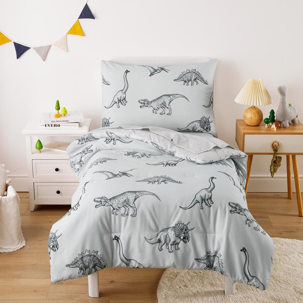 Wake In Cloud dinosaur toddler bedding set packaging highlights gift-ready presentation.