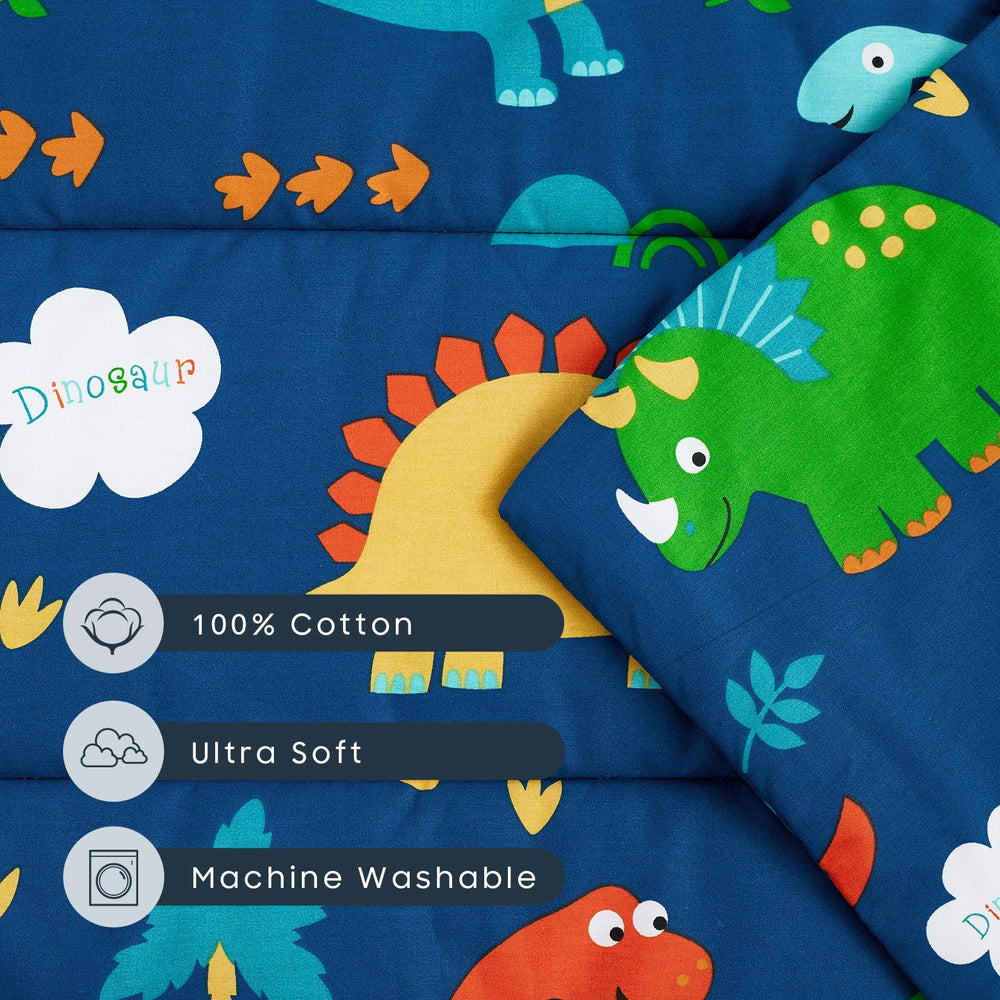 Wake In Cloud dinosaurs on navy design invites imaginative naptime