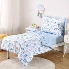 Wake In Cloud floral-toddler-bedding-flat-sheet close-up highlighting colorful botanical pattern.