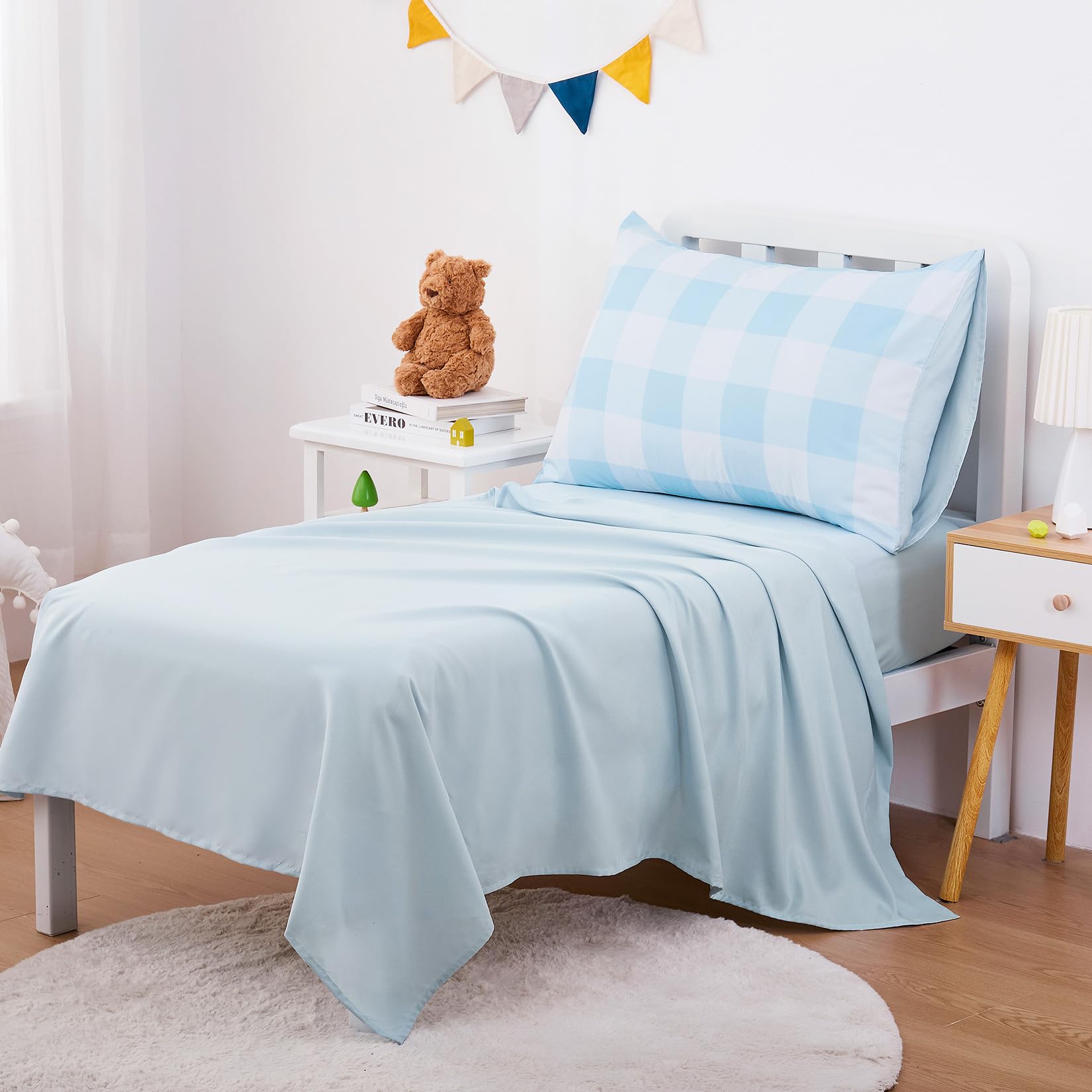 Wake In Cloud gingham toddler pillowcase close-up highlights durable stitching and cozy fabric