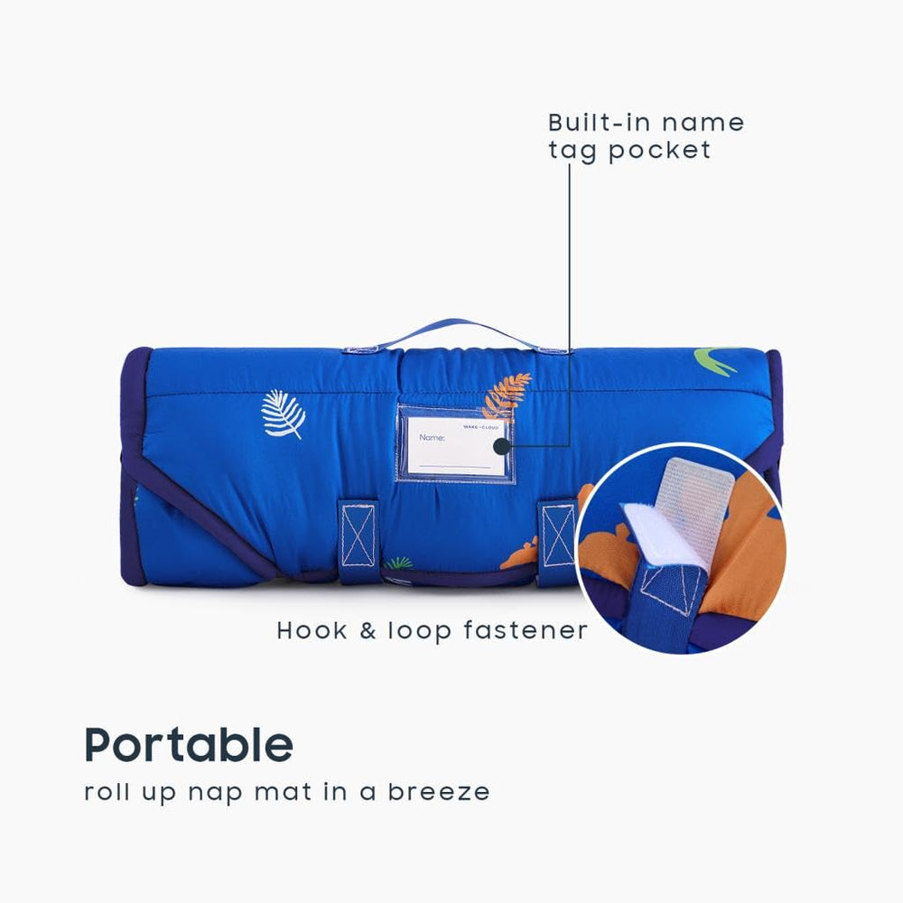 Wake In Cloud dinosaur blue mat fabric offers soft brushed microfiber comfort.